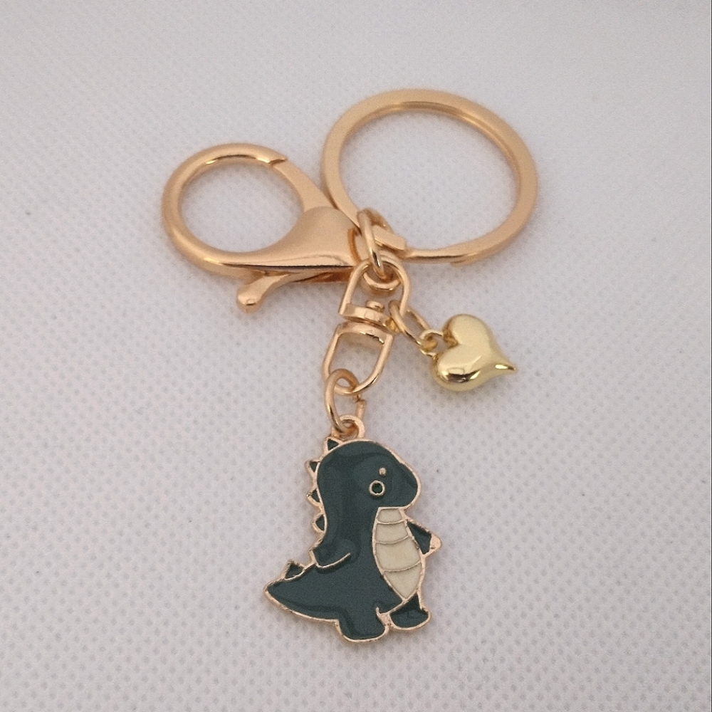 🧁 3/$30 Heart Stealing Dinosaur Keychain NEW